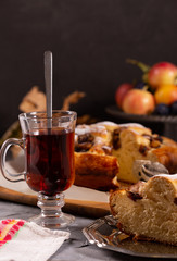 Fresh sweet fruit cake sprinkled with powdered sugar and cinnamon