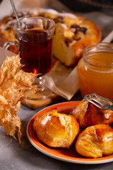 Fresh sweet fruit cake sprinkled with powdered sugar and cinnamon
