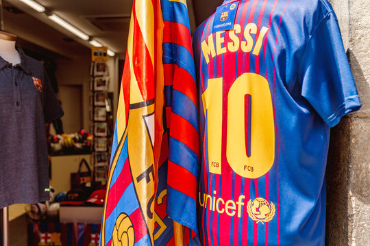 10 JULY 2018, BARCELONA, SPAIN: Messi shirts for sell at the souvenir shop