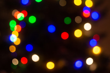 Christmas multi-colored lights on a black background, winter, bokeh, background