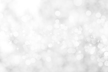Abstract background with White bokeh on gray background. christmas blurred beautiful shiny Christmas lights.