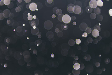 abstract sparkle bokeh light effect  with dark vintage background, abstract bokeh background