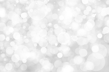 Abstract background with White bokeh on gray background. christmas blurred beautiful shiny Christmas lights.