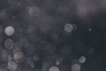 abstract sparkle bokeh light effect  with dark vintage background, abstract bokeh background