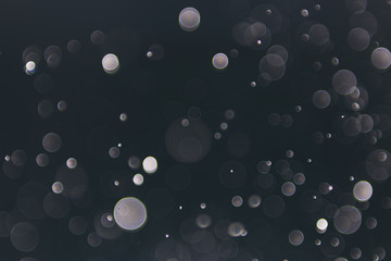 abstract sparkle bokeh light effect  with dark vintage background, abstract bokeh background