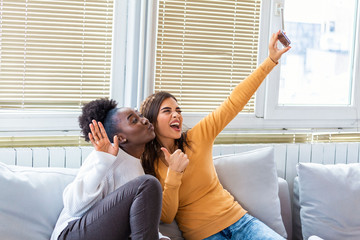 Happy young girl best friends having fun and smiling. Friends smiling for selfie. making selfie...