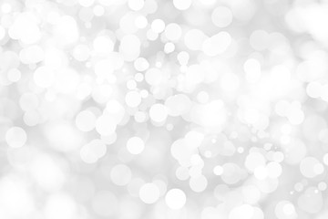 Abstract background with White bokeh on gray background. christmas blurred beautiful shiny Christmas lights.