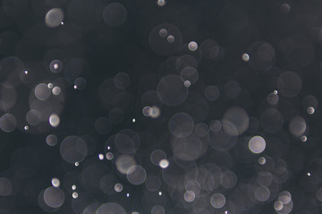 abstract sparkle bokeh light effect  with dark vintage background, abstract bokeh background