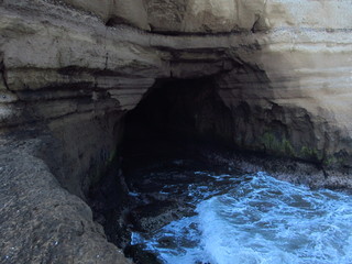 natural cave in the rocks by the sea