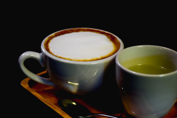 Coffee in white cup isolated with background. Coffee break delicious.