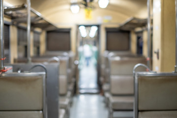 Fototapeta premium Nakhon Ratchasima,Thailind,2019. blurred photo.Inside the Thai train.The background of the rural life of the interior of the train is blurred.