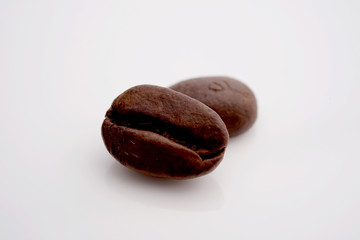 Coffee beans. Distributed isolated on white background