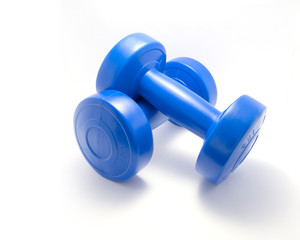 1 kilogram Exercise Dumbbells Crossed and Isolated on a White Background