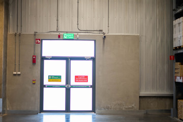 ikea bang yai - Thailand - .September 10,2019 : Fire Exit door in the warehouse, Emergency exit sign.