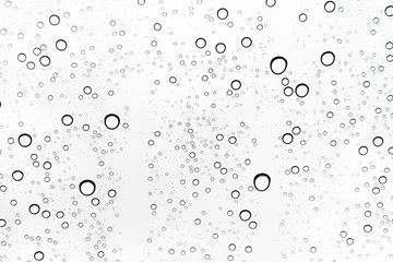Rain drops on window glasses surface Natural Pattern of raindrops. Natural pattern of raindrops on white background for your design.