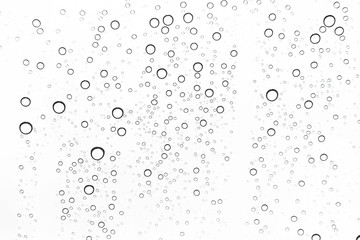 Rain drops on window glasses surface Natural Pattern of raindrops. Natural pattern of raindrops on white background for your design.