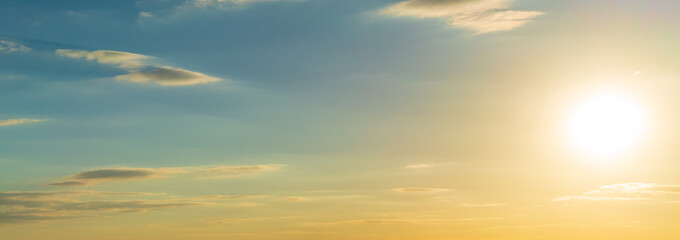 Blue sky and orange sunset panorama 