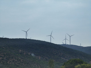 Wind Turbines on the hills in the nature for renewable energy
