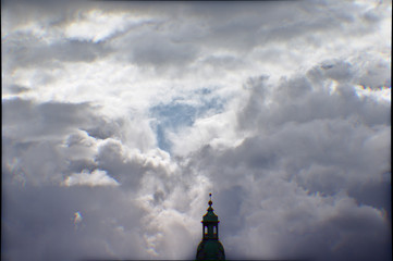 Cloudy Sky And Church Tower