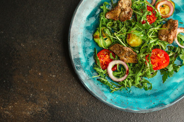 healthy salad with liver (tasty appetizer) menu concept. food background. copy space. Top view