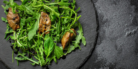 healthy salad with liver (tasty appetizer) menu concept. food background. copy space. Top view