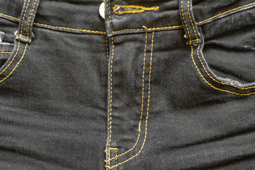Denim jeans background with seam of jeans fashion design. stitched texture denim jeans background...