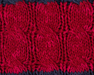 Texture of vinous with blue knitted fabric close up. Wool knitwear