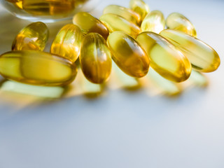Fish oil isolated on a white background. A bunch of omega 3 capsules. Close, high resolution...