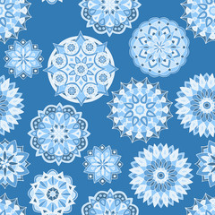 Seamless pattern with winter mandalas