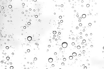 Rain drops on window glasses surface Natural Pattern of raindrops. Natural pattern of raindrops on white background for your design.