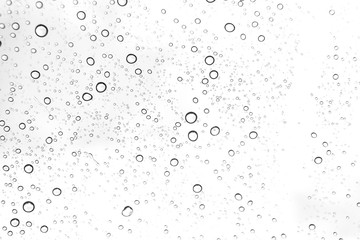 Rain drops on window glasses surface Natural Pattern of raindrops. Natural pattern of raindrops on white background for your design.