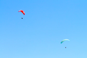 Two paragliders in the sky 