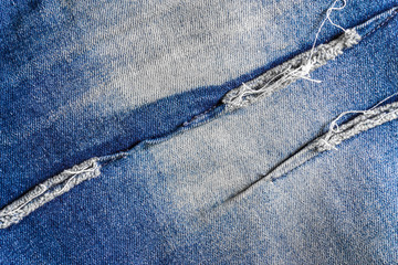 Jeans missing fashion. denim jeans background with seam of jeans fashion design. stitched texture...