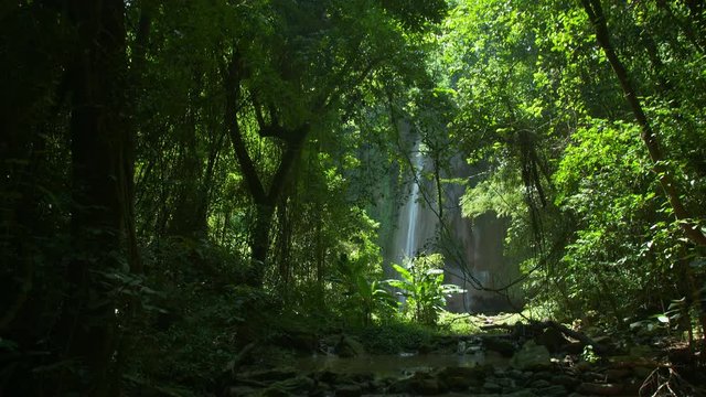 Amazing Unseen Waterfall view in deep forest Lush green leafes and sunshine in the morning. Saraburi Asia Thailand