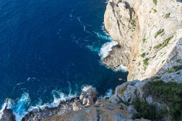 sea waves hit the rocks of the island in the Mediterranean sea