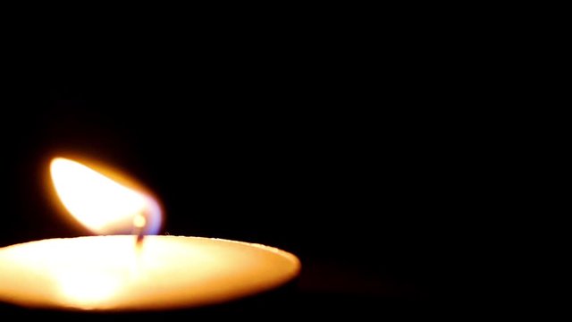 Blowing out the burning candle 