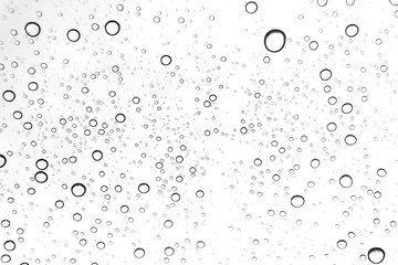 Rain drops on window glasses surface Natural Pattern of raindrops. Natural pattern of raindrops on white background for your design.