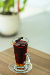 Christmas mulled wine on a wooden table. Traditional hot drink at Christmas (red wine with spices, New Year's Eve, Noel holiday festive) x-mas flat lay. food background. copy space. Top viev