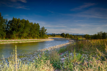 View of the Czarny Dunajec river and distant mountains.