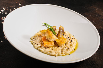 risotto fish (main course rice with seafood) menu concept. food background. copy space. Top view