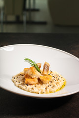 risotto fish (main course rice with seafood) menu concept. food background. copy space. Top view