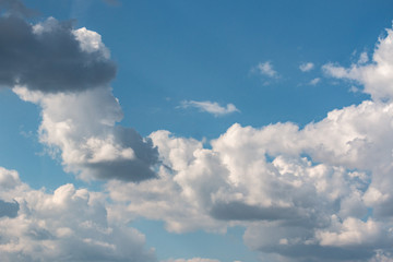 white clouds in the blue sky during