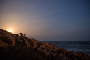 natural landscape of sea rocks and sand