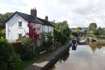 Naklejka premium houses on the river (brecon beacons national park, the canal in Brecon) 