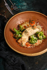 fish with broccoli (delicious fish dish, baked main course) menu concept. food background. copy space. Top view