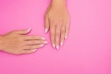 Obraz na płótnie Canvas Stylish trendy female manicure. Beautiful woman's hands on soft background.