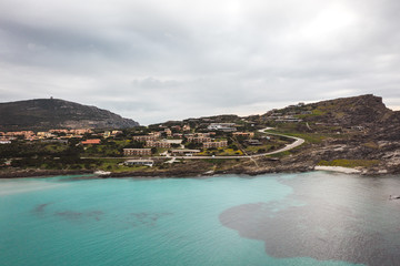 Naklejka premium Amazing Aerial photo on sardegna town during the cloudy day