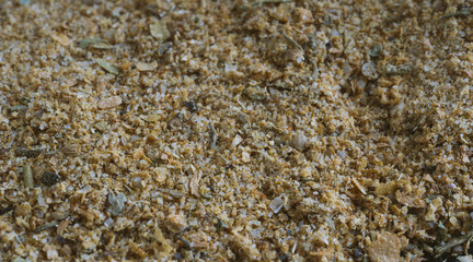Spices and seasoning for cooking. The structure of the mixture of dried herbs. Texture of close-up, spice or seasoning as background
