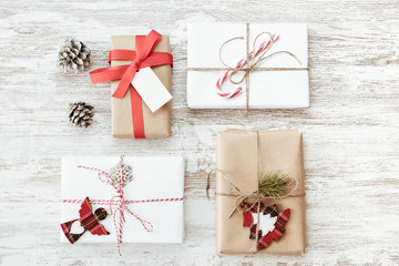 Christmas handmade present with tag for Merry Christmas and New year holiday. Rustic craft gift boxes. vintage color tone image