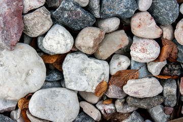 Top view on pavement stones close-up. Cobblestone road.